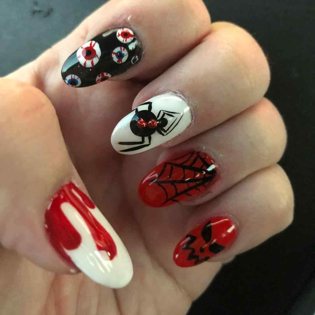 modelos de uñas con arañas para halloween