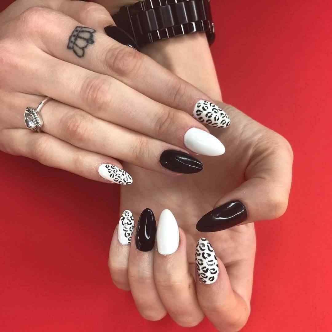 uñas blancas y negras animal print