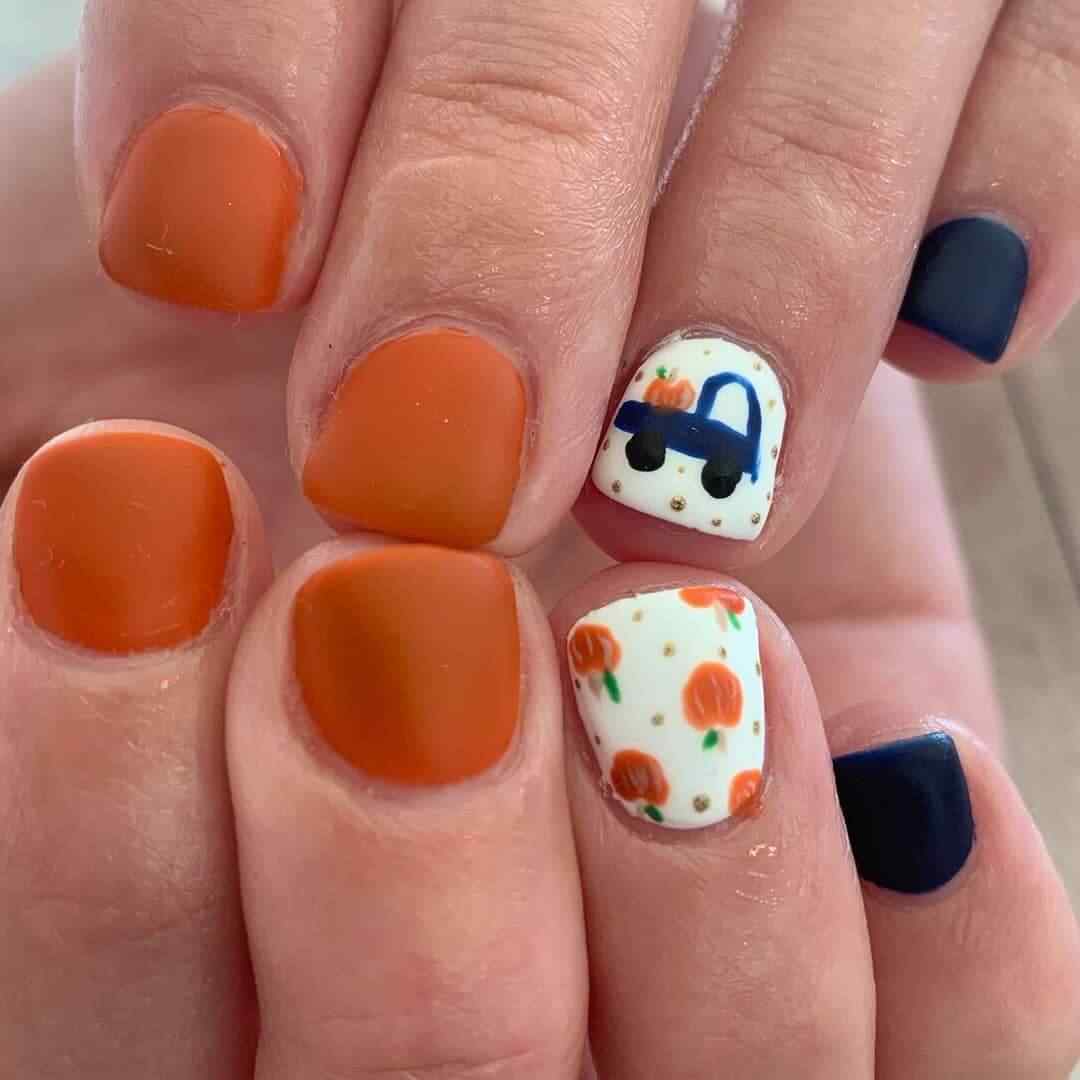 uñas con calabaza para halowen