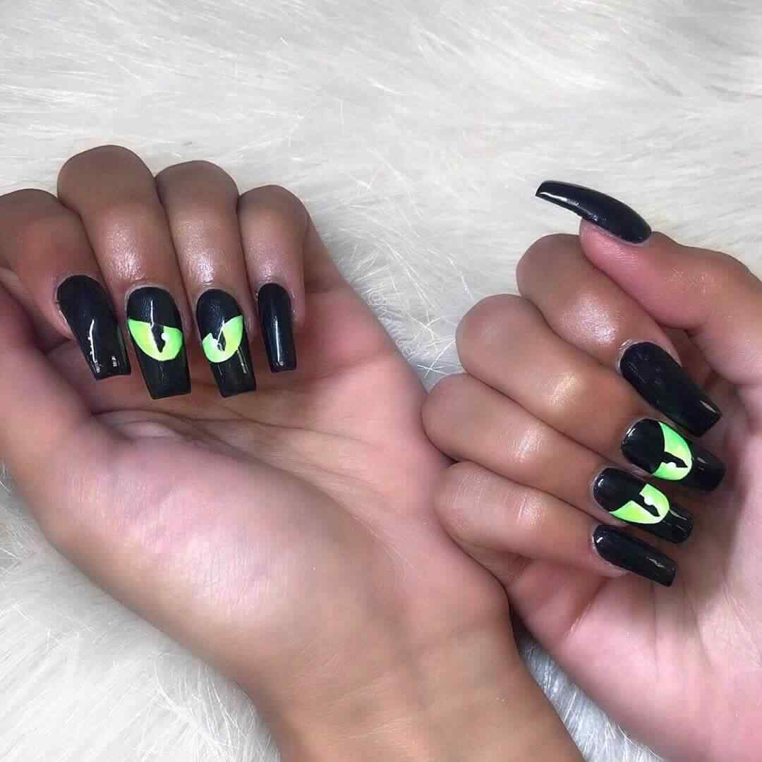 uñas con ojos de gato halloween