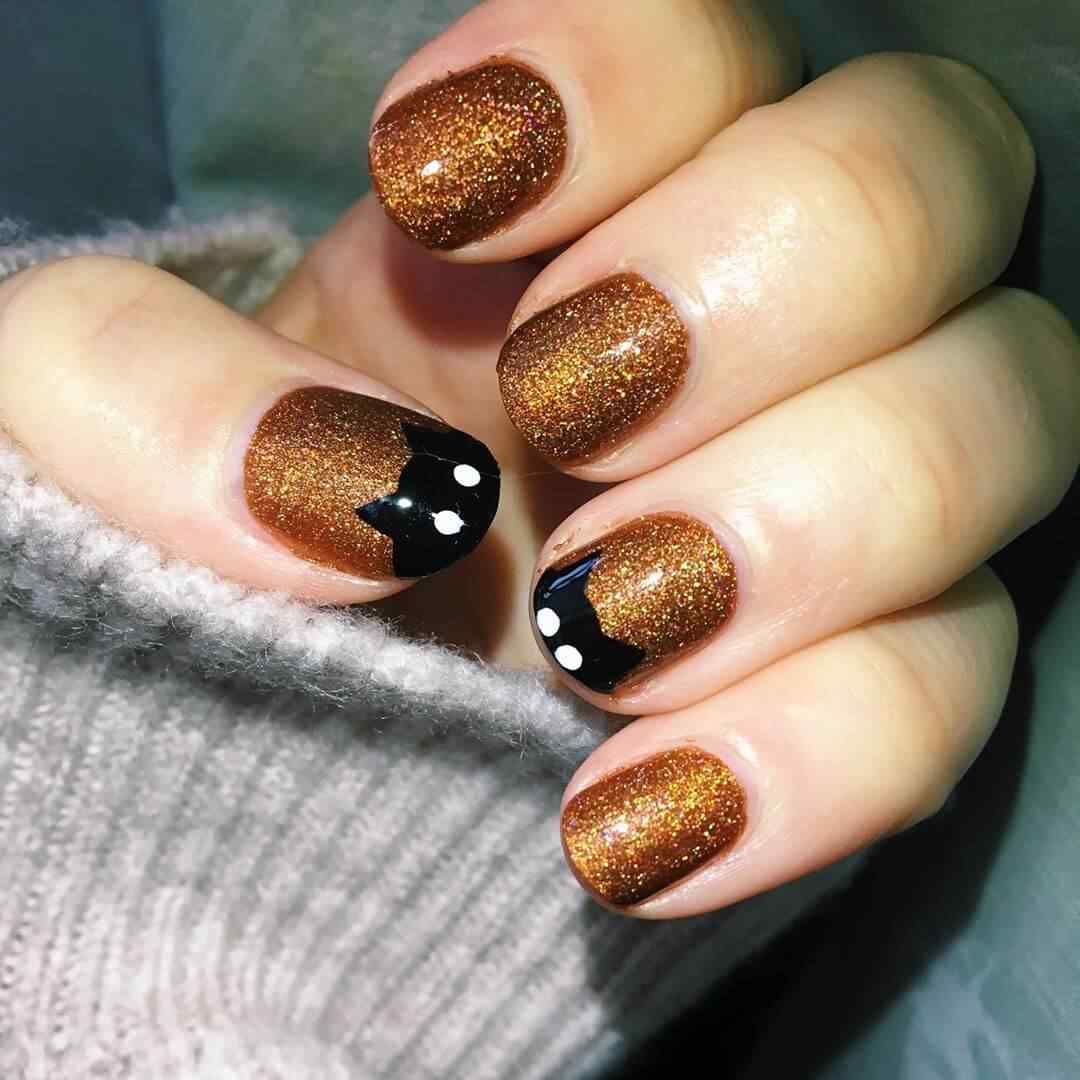 uñas de halloween gato negro